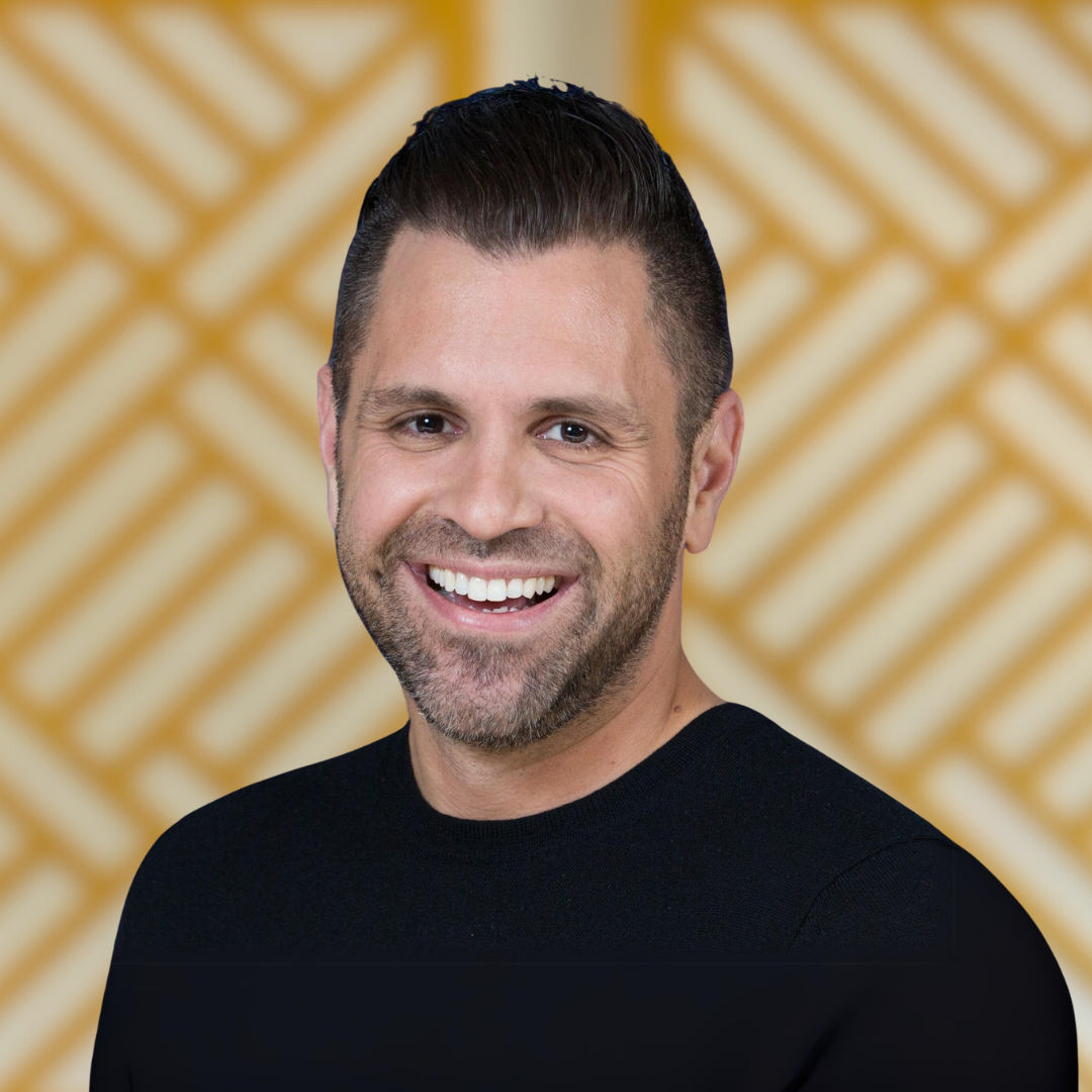 Jonathan Flatow in front of a yellow background